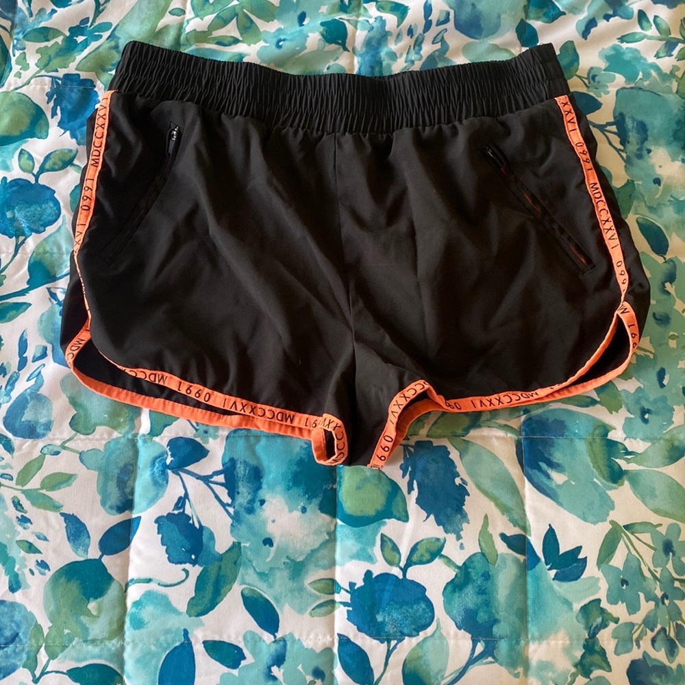 Black and peach athletic shorts